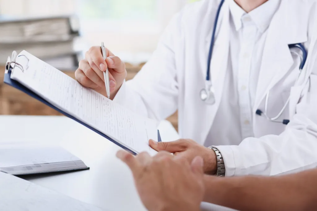 american hearing aid specialist goes over the results of their patient's hearing test